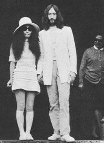 Yoko, John, and stranger